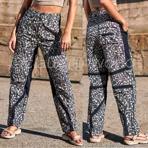 FREE PEOPLE MOVEMENT Love You Back Floral Printed Cargo Pants in Black